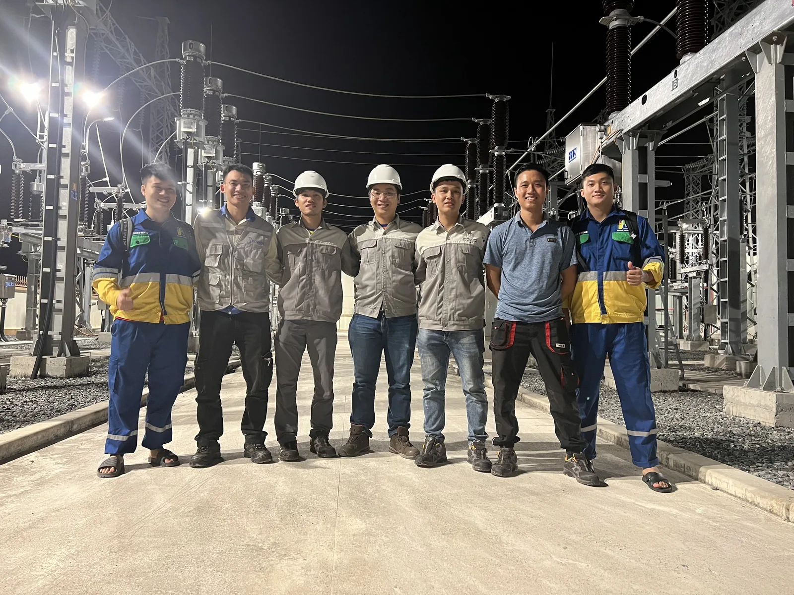 ITS team at a substation at night